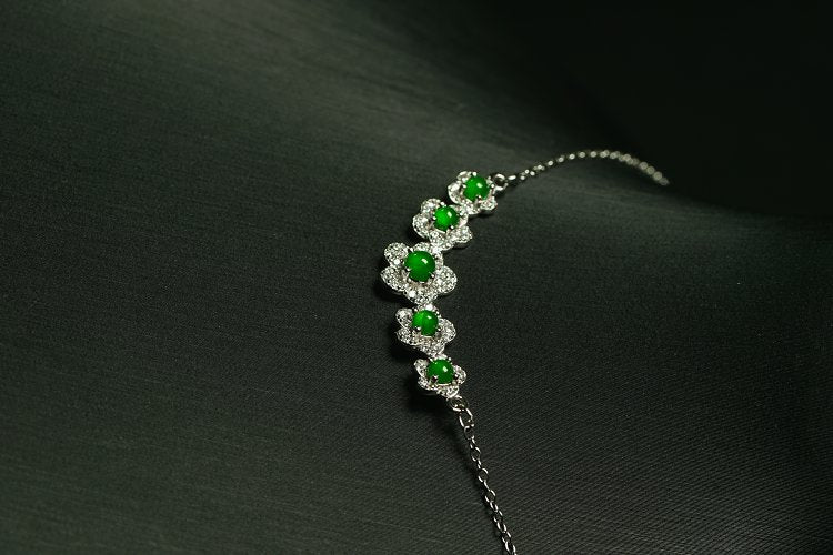 翠花簇颈 天然 A 货翡翠冰种阳绿银镶钻五瓣花手链